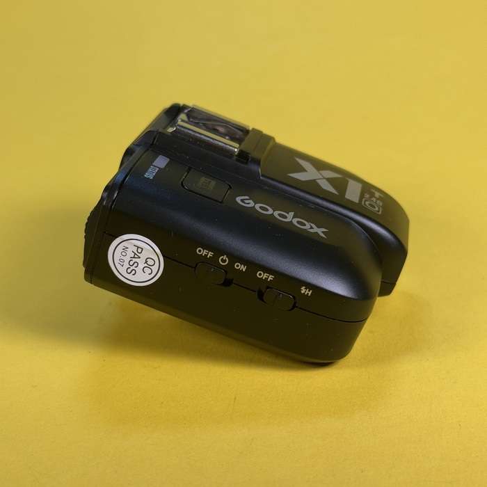 Blesk Godox TT685O + Odpalovač T1X  Olympus