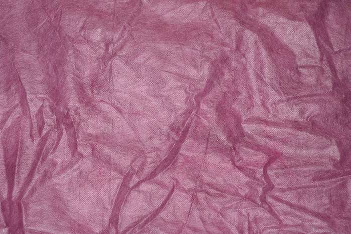 Pozadí průhledně růžové - netkaná textilie